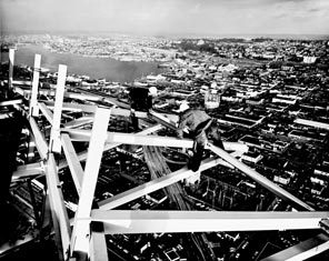 Construction workers check the joists on the Space Needle as work on the landmark progressed in the fall of 1961. Eddie Carlson, executive vice president of Western Hotels and chairman of the Washington World's Fair Commission, conceived of the Needle after dining atop a television tower in Stuttgart, Germany. The photo by Ralph Crane appeared in LIFE magazine.