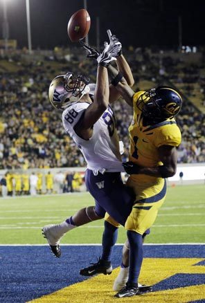 On one play where Washington did a great job holding on to the ball, Austin Seferian-Jenkins (88) was able to come down with this catch for a 29-yard touchdown reception against California's Steve Williams. 