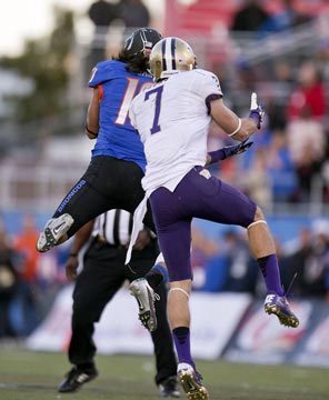 Boise State safety Jeremy Ioane steps in front of Washington's Cody Bruns, making the interception with 14 seconds left that clinched his team's win. 