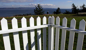 There’s a view of Admiralty Inlet and Whidbey Island from a vacation rental, once the home of Fort Flagler’s engineer, where a volunteer recently repainted a picket fence. 