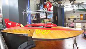 The Slo-mo-shun IV hydroplane, which  raced during Seafair in the 1950s, hangs from the ceiling at MOHAI. It’s one of many historical artifacts at the museum. 