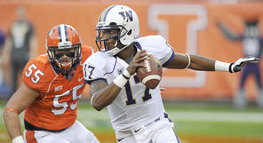  Keith Price (17) was again brilliant in leading the Husky offense, which finished with 615 yards.