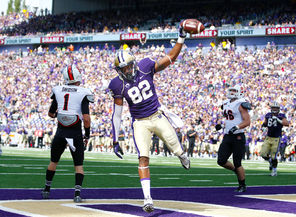 Washington tight end Joshua Perkins enjoys his 1-yard touchdown catch, which came right in the middle of six consecutive first-half touchdown drives for the Huskies.