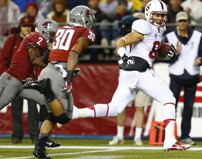 Stanford's Devon Cajuste caught two  touchdown passes, including this one of  57 yards,   as the Cardinal jumped out to a 17-3 first-half lead.