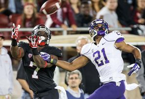 Stanford’s Ty Montgomery (7) comes down with this 39-yard touchdown pass in the second quarter against  Washington's Marcus Peters for a 17-7 Cardinal lead.