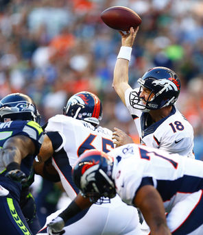 Denver’s Peyton Manning throws   against the Seahawks in an August exhibition game. “I think you take something away from every experience,” coach John Fox said.