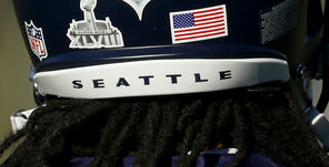 Seahawk Richard Sherman’s helmet includes the logo for this year’s Super Bowl.