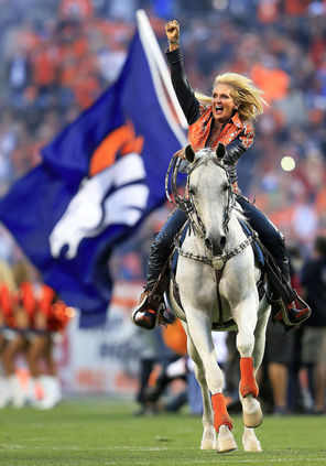  Ann Judge-Wegener rides Thunder before a Broncos game this season at Sports Authority Field.