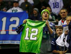 Seahawks fans show their spirit during Super Bowl XLVIII Media Day on Tuesday at the Prudential Center in Newark, N.J.