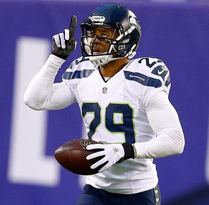 Readers select safety Earl Thomas as the defensive MVP, and Jenks agrees. 