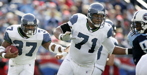 In December of 2005,  Walter Jones (71) leads the way for  Shaun Alexander who won the MVP that season as Seattle went to the Super Bowl.