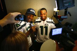  Seahawks receiver Phil Bates, left,  interviews teammate and fellow receiver Percy Harvin during a media availability session. <br/>