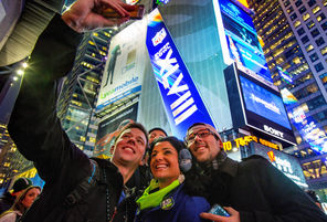 A group of Seahawk fans take a self-picture while visiting Times Square. But tourist activities will come to a pause today as Super Bowl XLVIII has arrived.