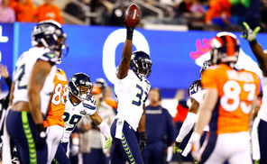 Seahawks safety Kam Chancellor (31) celebrates after intercepting a pass from Denver quarterback Peyton Manning.<br/>
