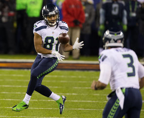 Seahawks  receiver Golden Tate (81) catches a pass from  quarterback Russell Wilson (3)  during the second half of the Super Bowl. 
