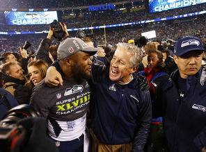 Seahawks  fullback Michael Robinson, left, and  coach Pete Carroll embrace after the Super Bowl.