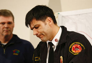 An emotional Travis Hots, chief of Snohomish County Fire District 21/22,    speaks at a news conference Tuesday in Arlington. He described a visit to the mudslide, saying the damage was far worse than he had imagined. 