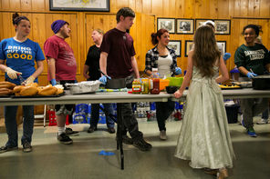  Food is served to the public Monday at a temporary Red Cross shelter at the Darrington Community Center. The town of 1,400, just up the road from Oso, is in an area where “everybody knows everybody,” a high-school student said. 