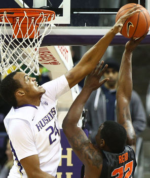  Washington center Robert Upshaw (24) stops Oregon State forward Jarmal Reid (32) with one of his six blocks in the game, and school-record 72 so far this season.